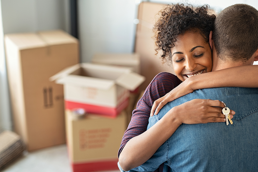 Young Couple moving into first home 